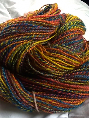 Handgesponnene Wolle "Papagei Lora" (anabelcolori)
